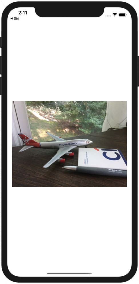 A picture containing mirror, table, bed

Description automatically generated